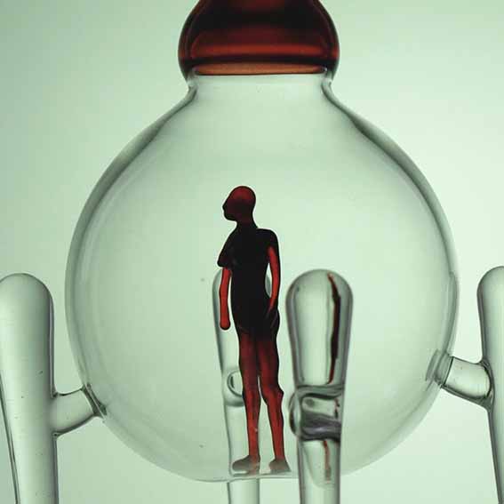 lampworked female figure in a glass bubbble sci fi sculpture
